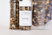 Assorted clear packages of Trail Mix Insect Blend, showing off the variety of insects throughout.
